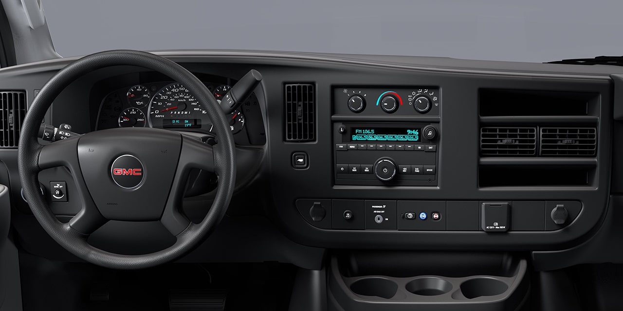 Interior View of the Steering Wheel and Dashboard in the Savana Cutaway Van