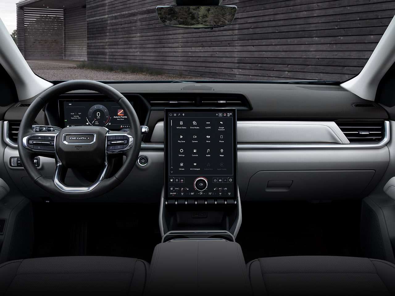 Interior View of the Dashboard, Steering Wheel, and Infotainment System in the 2026 GMC Terrain Elevation Small SUV
