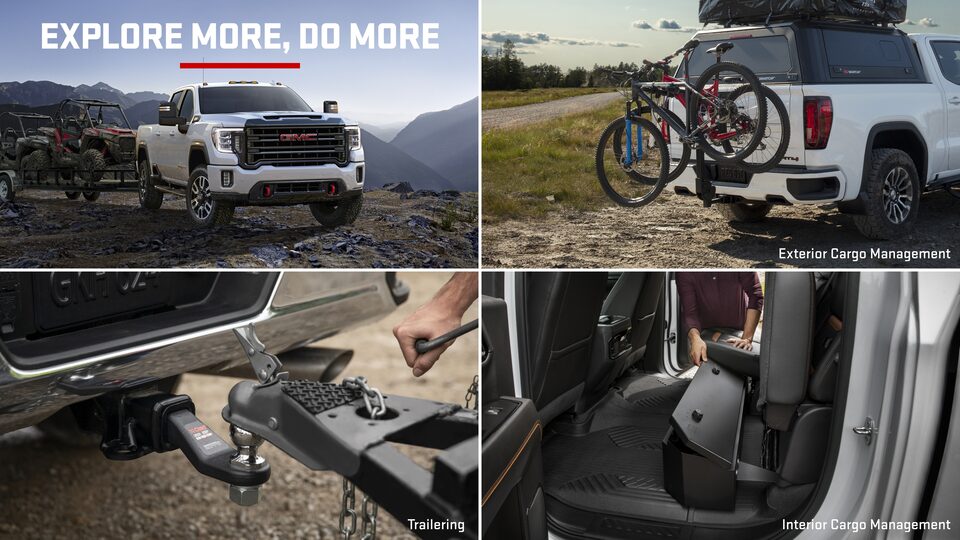 A White GMC Vehicle Towing a Trailer