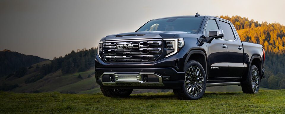 The Stunning GMC Sierra HD Denali Ultimate Parked Off-Road on Grass