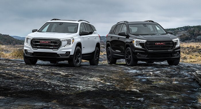 A Lineup of the GMC Terrain AT4 in both White and Black