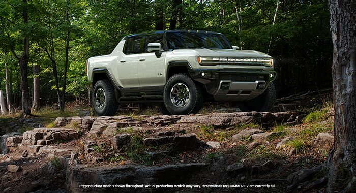 The Stunning GMC Yukon Denali Parked Off-Road with Mountains in the Background