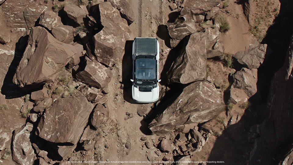 Bird's Eye View of GMC HUMMER EV Electric Pickup Truck in Desert