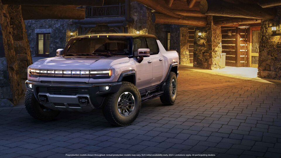 GMC HUMMER EV Electric Pickup Truck Parked outside Lodge