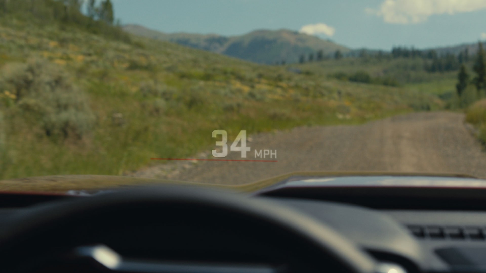 A View From the GMC Canyon AT4X Interior Showing a Head-Up Display Projecting 34 MPH on the Windshield