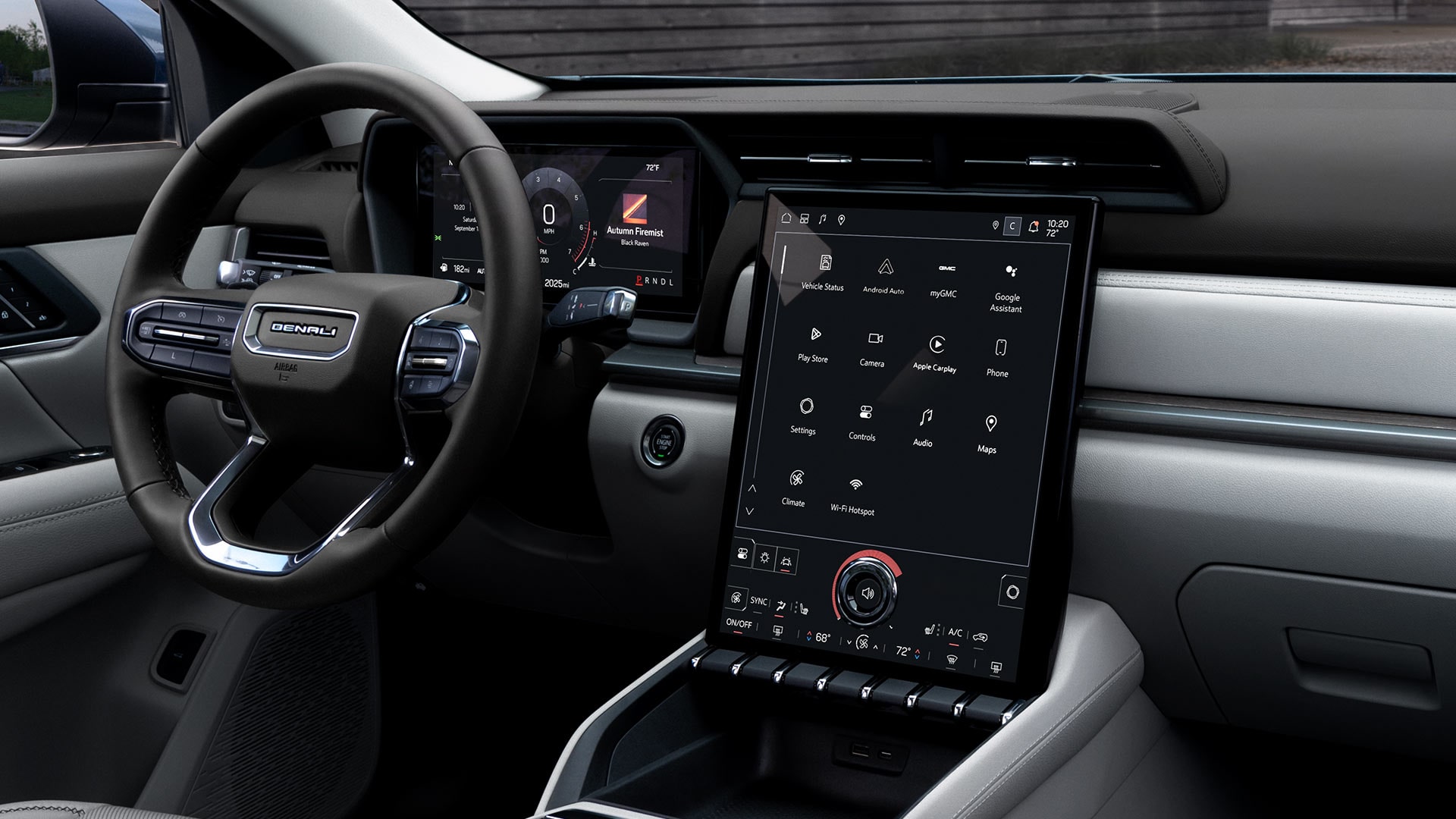 The Interior of a GMC Denali with a Large Infotainment Screen and Digital Instrument Cluster