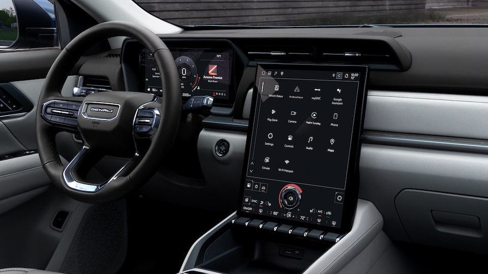 The Interior of a GMC Denali with a Large Infotainment Screen and Digital Instrument Cluster