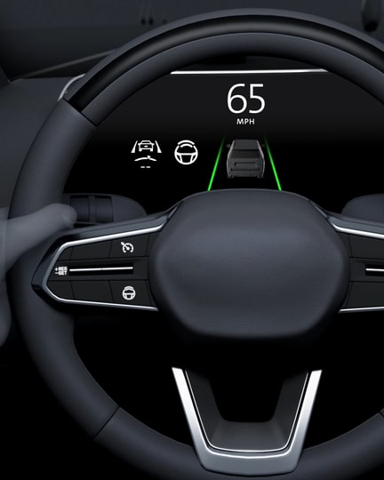 A Driver Engages the Advanced GMC Super Cruise System Using the Steering Wheel Controls