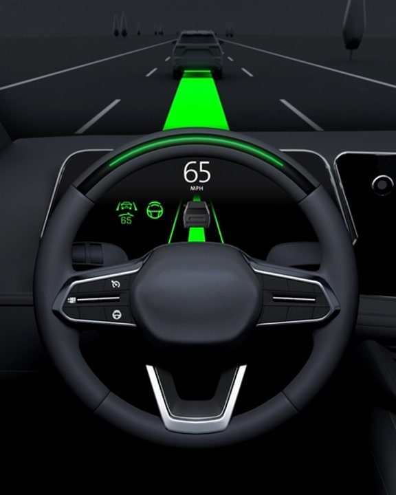 The GMC Super Cruise Display Shows a Vehicle Maintaining Speed on the Road