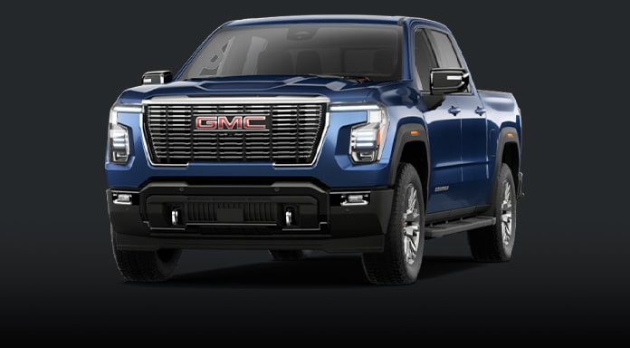 Front Three Quarter View of a Blue GMC Sierra AT4 Truck