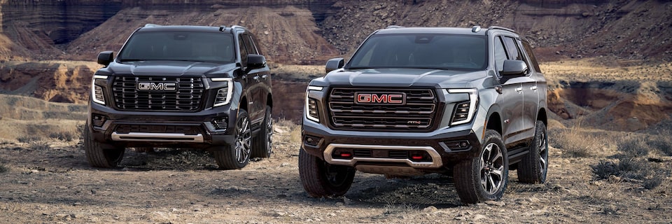The 2025 GMC Yukon and Yukon XL Parked Next to Each Other in the Desert