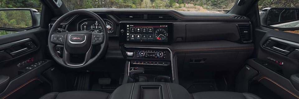 Interior Steering Wheel and Dashboard of a GMC Truck