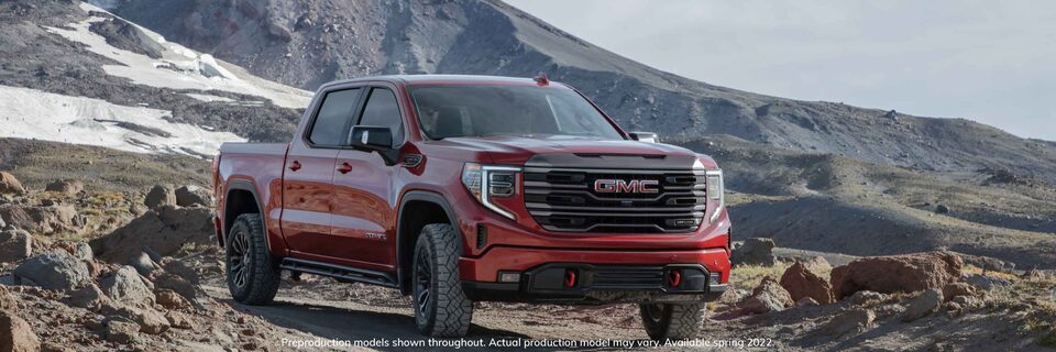 2022 GMC Sierra 1500 AT4: Three-Quarters View Parked In The Mountains