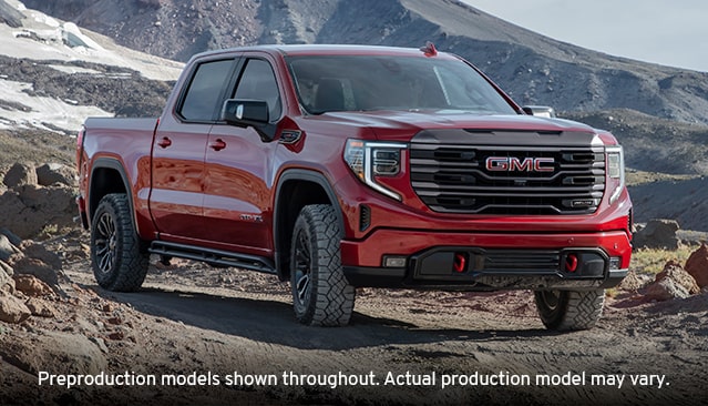 2022 GMC Sierra 1500 AT4: Three-Quarters View Parked In The Mountains 