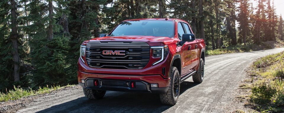 2022 GMC Sierra 1500 AT4: Front View Driving Through The Woods