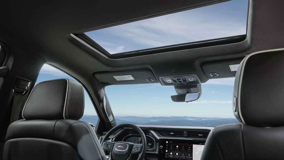 2022 GMC Sierra 1500 AT4: Interior View Of Front Seats From Backseat Passengers View