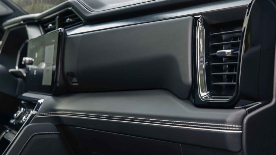 2022 GMC Sierra 1500 AT4: Closeup View Of The Leather Interior On The Glove Box