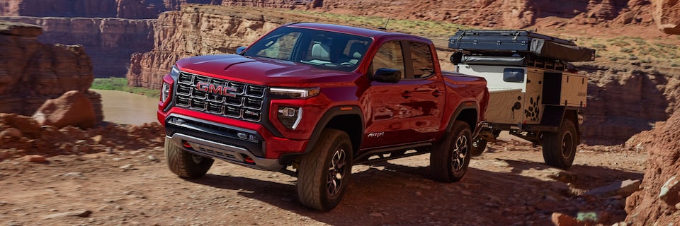 A GMC Canyon AT4X Off-Roading While Pulling a Trailor with Ease