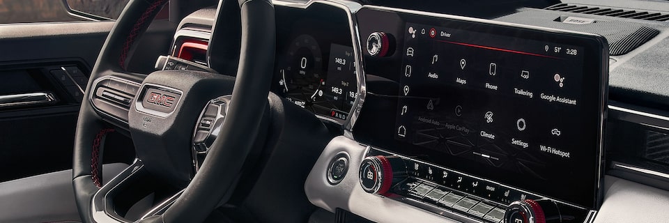 Passenger Side View of the Interior Dashboard and Steering Wheel of the GMC Canyon AT4X
