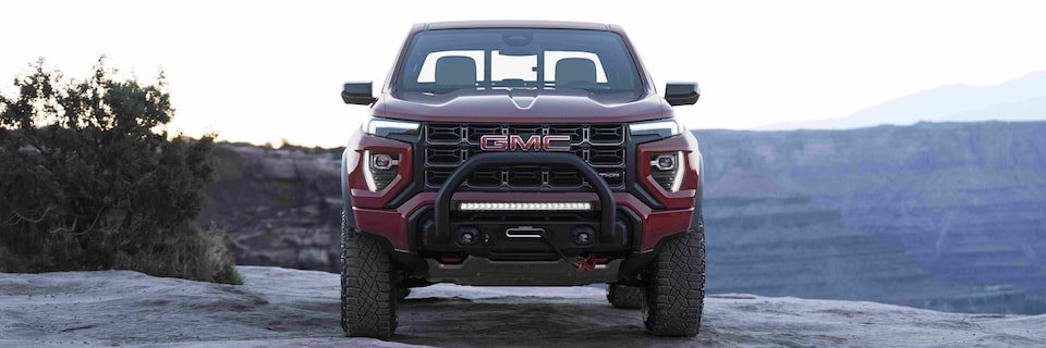 The Unique Wide Stance of the Powerful New GMC Canyon AT4X Parked Off-Road by Water