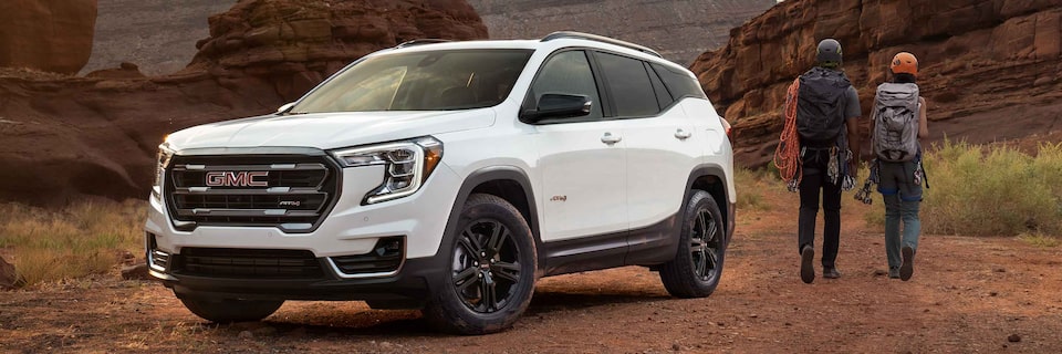 Couple Hiking with their 2022 GMC Terrain AT4 SUV