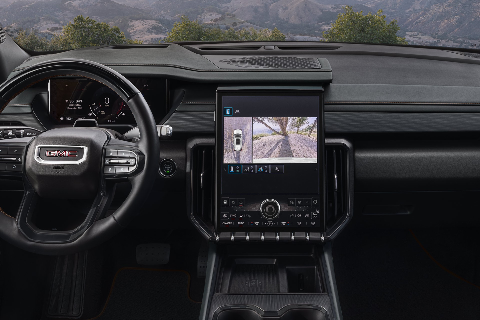 The Interior Dashboard of a GMC SUV, Featuring a Large Center Screen Displaying a 360-Degree Camera View