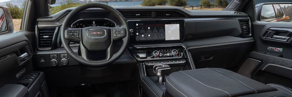 Interior View of the Steering Wheel and Dashboard in the GMC Sierra AT4X