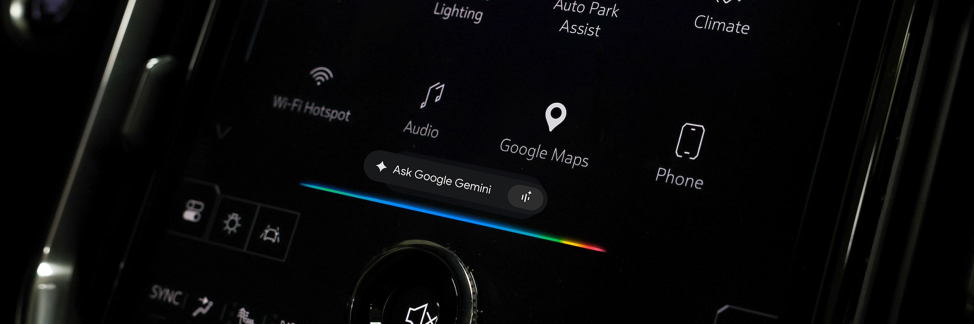 A Close-Up of a Vehicle's Infotainment Screen Displaying App Icons for Google Maps and Google Gemini