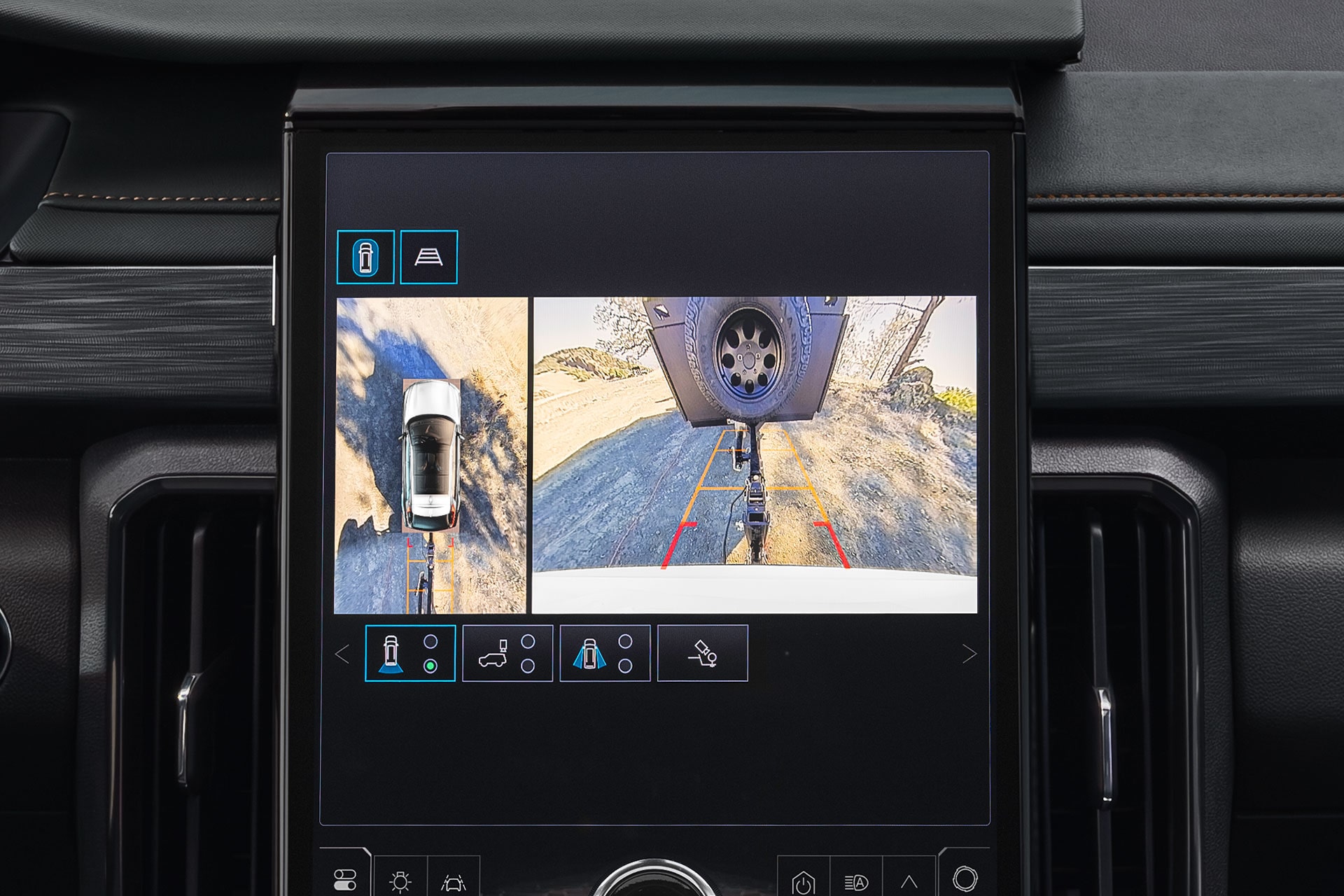 The GMC Acadia Infotainment Screen Displaying a 360-Degree Camera View of the Car with a Trailer Hitch Connected