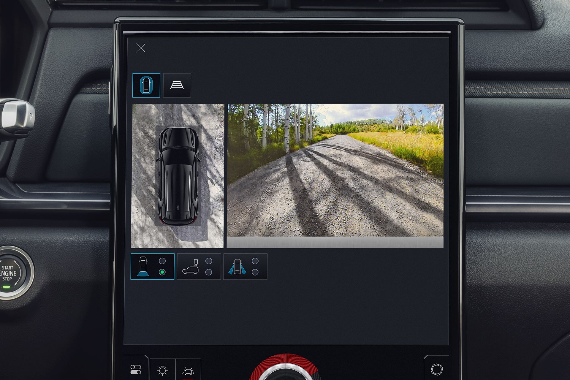 The GMC Acadia Infotainment Screen Displaying a Top-Down View of the Car and a Camera View of a Dirt Road
