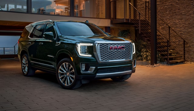 GMC Yukon Denali Luxury SUV passenger side angle view