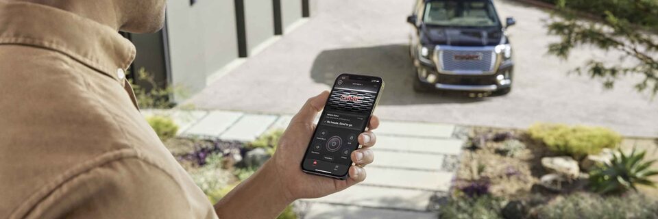 Man using myGMC Mobile App