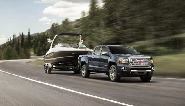 GMC Canyon Denali Tows Boat Exterior Wide Angle