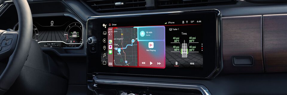 Close-up of a GMC Vehicle Dashboard and Infotainment Screen Display a Maps View