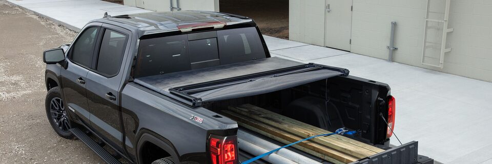 GMC life tonneau hard rolling cover.