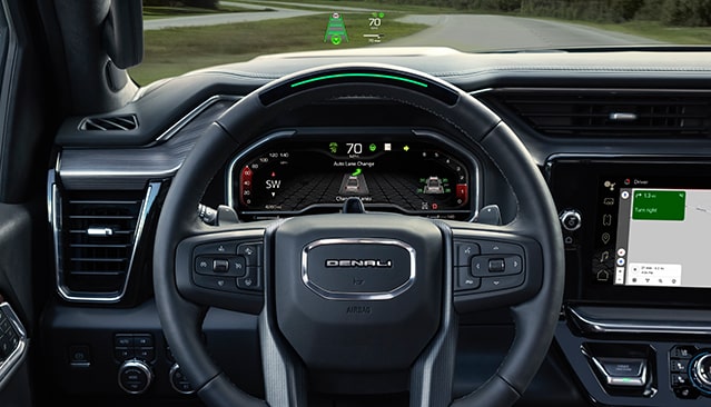 Close-up View of the Steering Wheel Displaying the Hands-Free Driving Super Cruise Technology