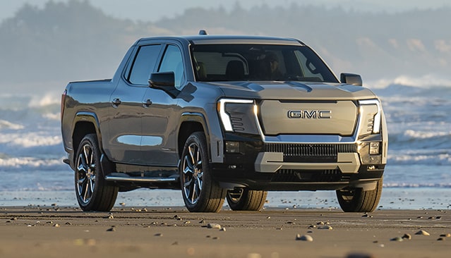 The Sierra EV Pickup Truck Parked on the Beach