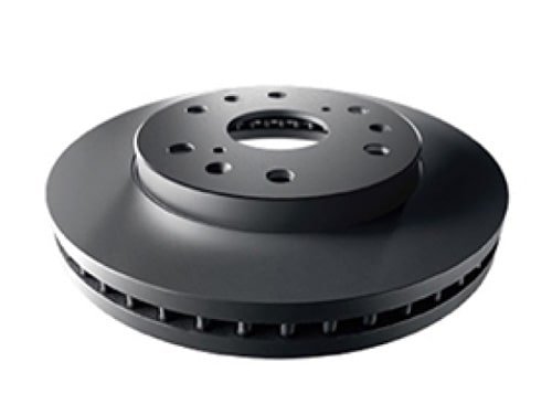 GMC Certified Service Technician Installing New Wheel on a Vehicle