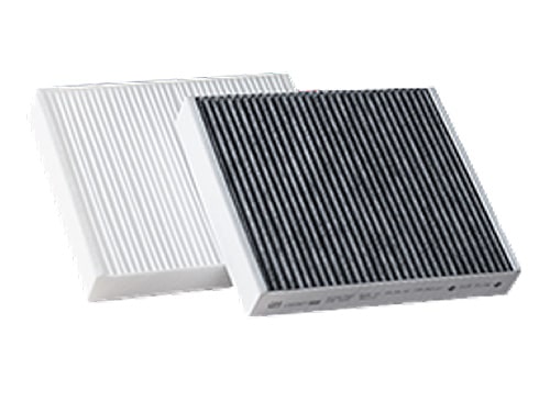 GMC Certified Service Technician Installing New Wheel on a Vehicle