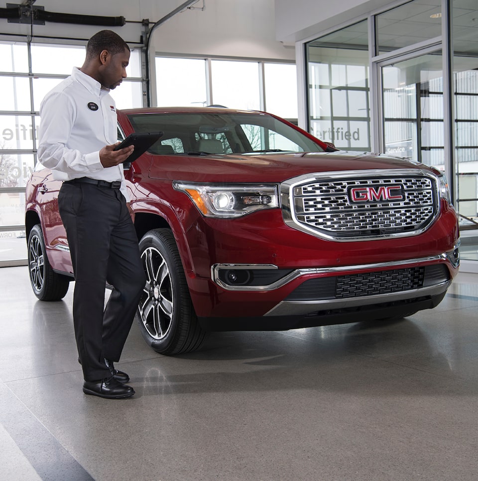 GMC Protection expert inspecting 2020 Terrain Denali Small SUV
