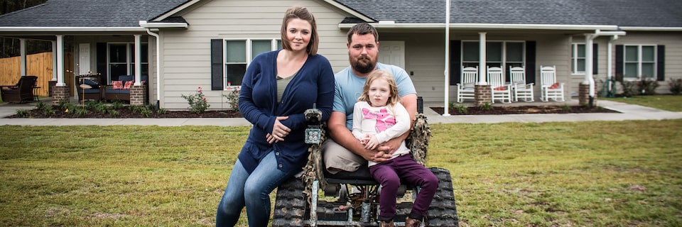 Image of a veteran and his family.