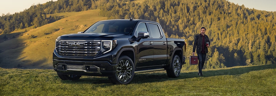 Man getting into his GMC truck