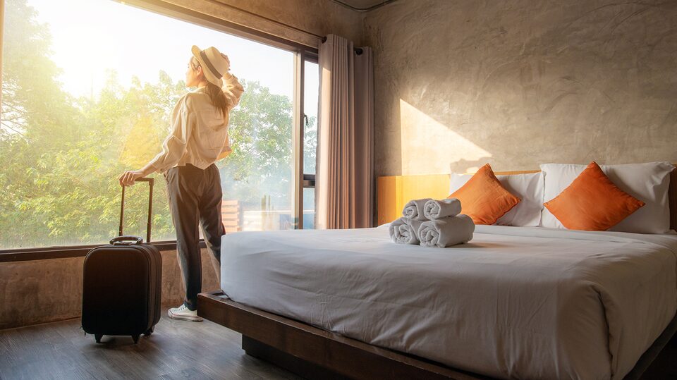 Woman Booking a Hotel Room Using My GMC Rewards
