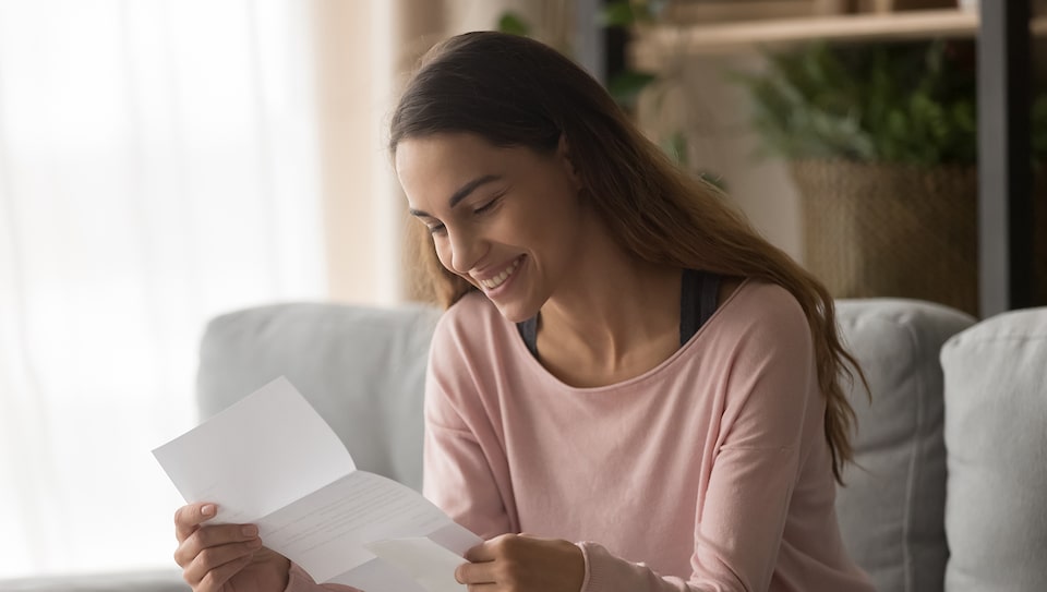 Woman Viewing Her GM Extended Family Card Statement