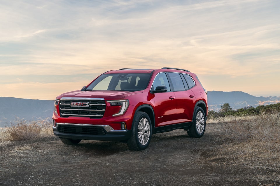 GMC Vehicle on top of a mountain