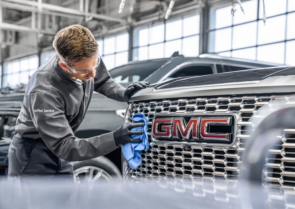 Man working on GMC vehicle service