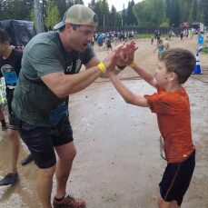 Father and son participating in the GoPro Mountain Games