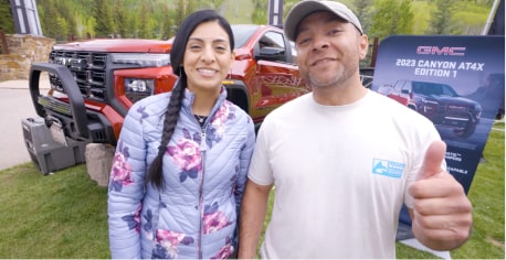Chris and Leticia talking about My GMC Rewards at the GoPro Mountain games.