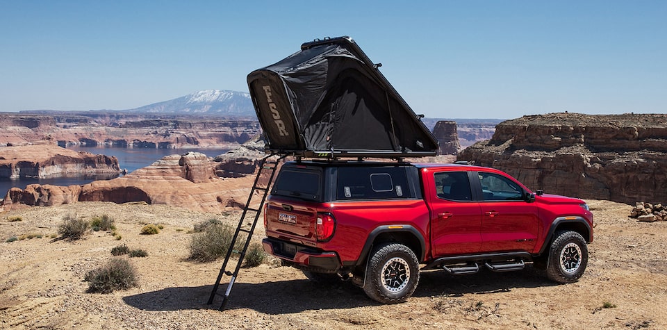 red truck with tent accessory