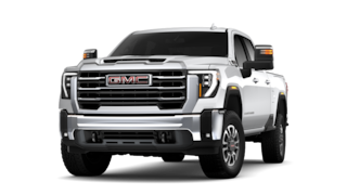 Front Three-Quarters View of a Silver 2026 GMC Sierra HD Pickup Truck
